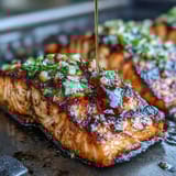 Grilled salmon with strawberry salsa, a fresh and colorful spring dinner bursting with vibrant flavors and juicy fruit topping.  